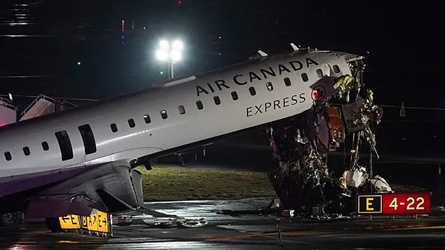 Two dead as air Canada plane collides with fire truck at airport